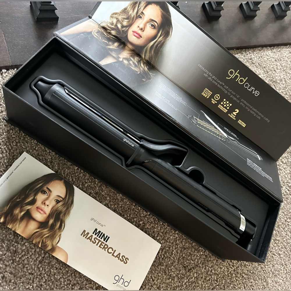 GHD curve iron. New! Never used or taken out of box!